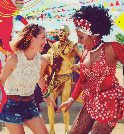 Two women dance along in Barranquilla. Read more to find out about the LGBT history in Colombia