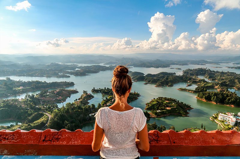 Colombia country is located in the north South America – A woman in Guatapé, Colombia | Colombia Country Brand