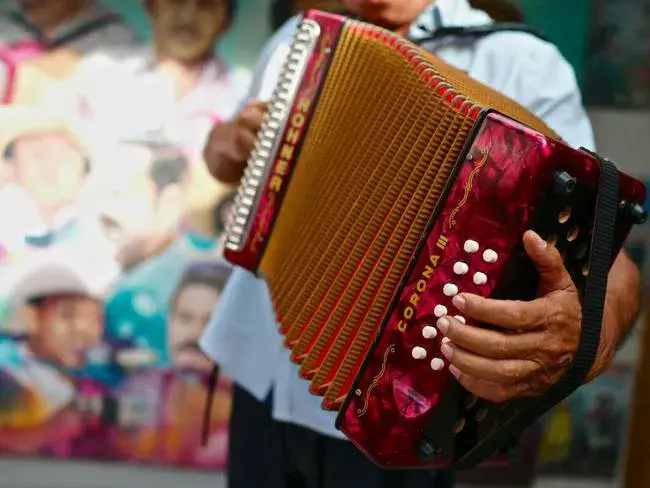 Man playing a Hohner Corona accordion