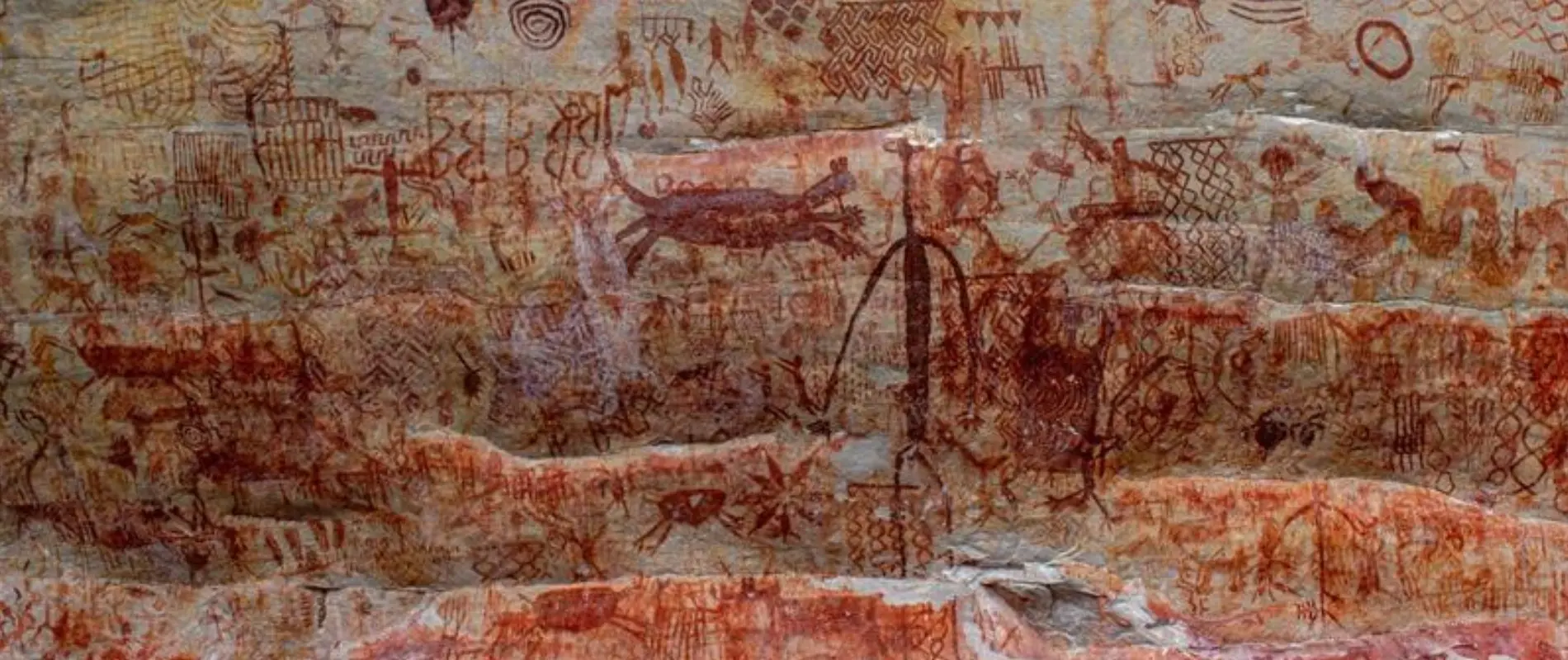 Rock art figures carved on a rock located in Santander, Colombia
