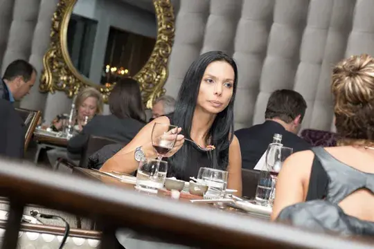 Woman eating at Criterion restaurant