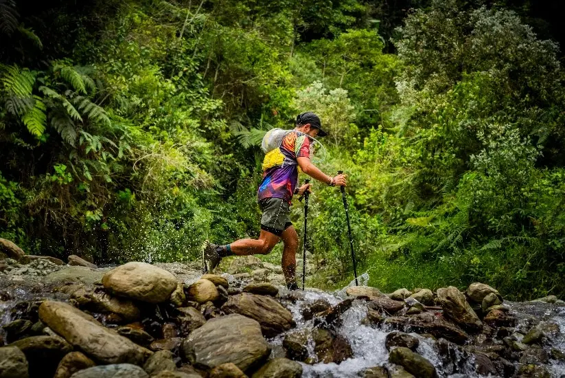 Man crossing a mountain participating in Pijao Trail