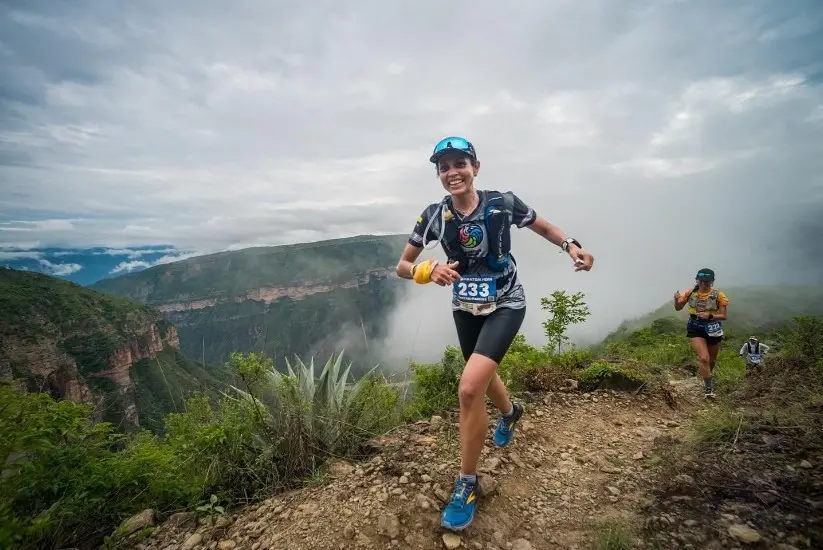 Woman running in the Chicamocha Canyon Woman running in the Chicamocha Canyon