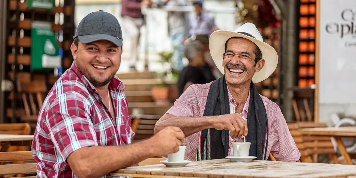 People sharing a cup of coffee