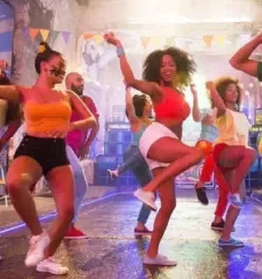 Group of people dancing champeta