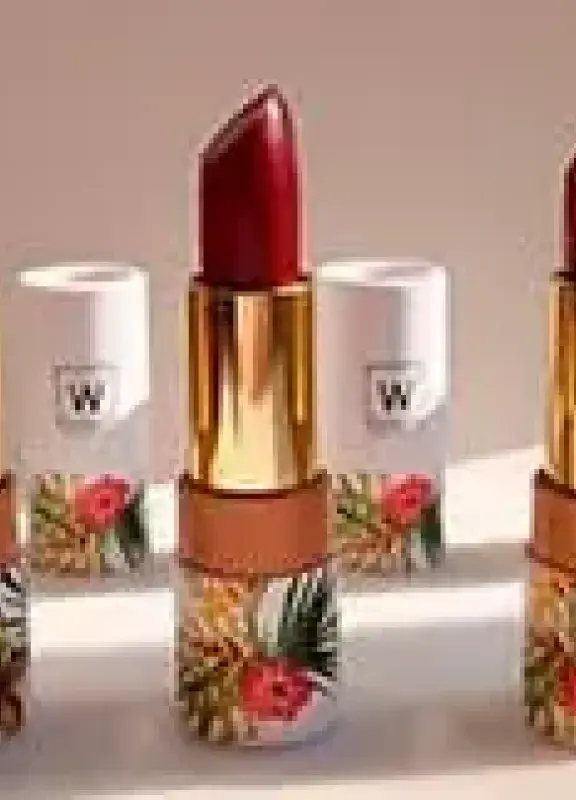 Three Waya lipsticks in shades of pink and red.