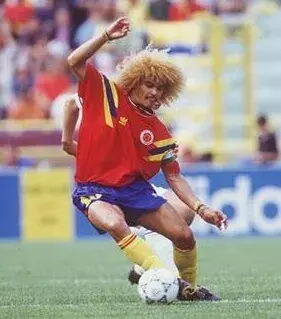 Carlos Valderrama, Colombian soccer player, with his distinctive curly blond hair,