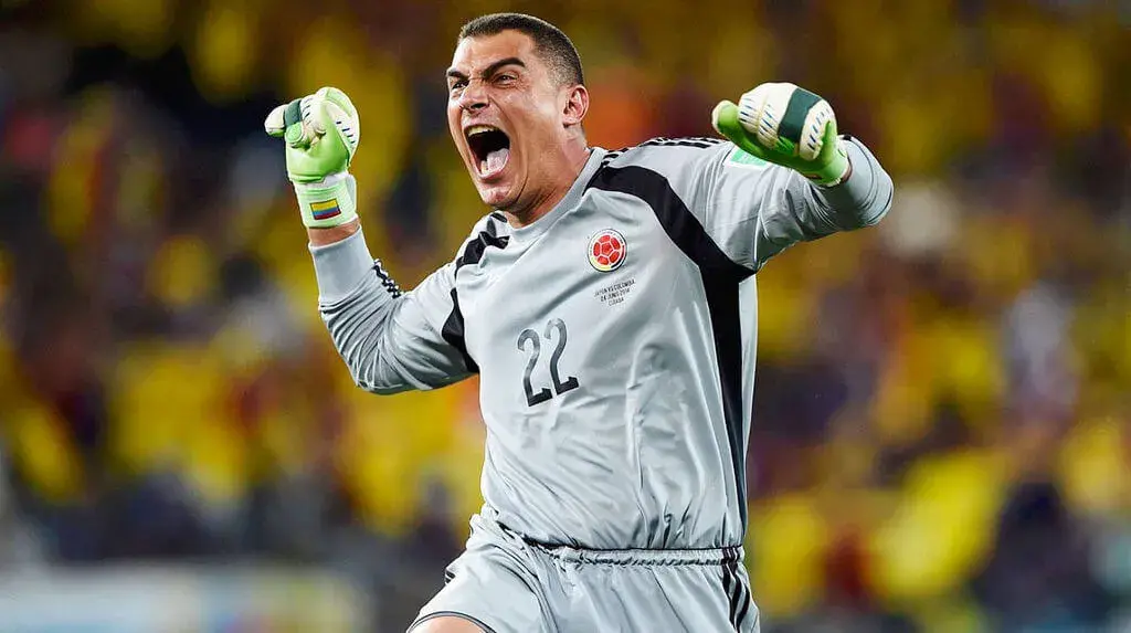 Faryd Mondragón celebrates with euphoria on the soccer field.